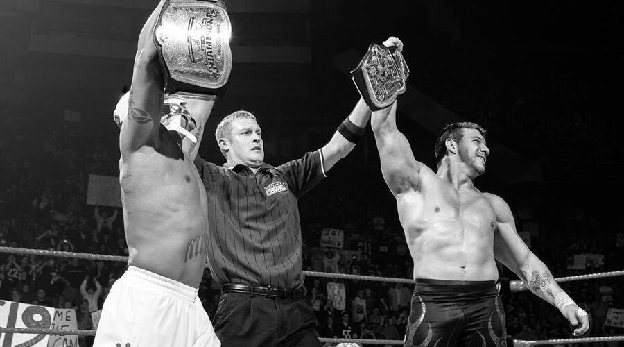 Eddie Guerrero and Rey Mysterio as WWE Tag Team Champions.